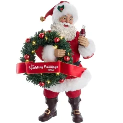 Kurt Adler Tabletop Items* 10.5-Inch Fabriche™ Coca-Cola® Battery Operated Santa With Lighted Wreath